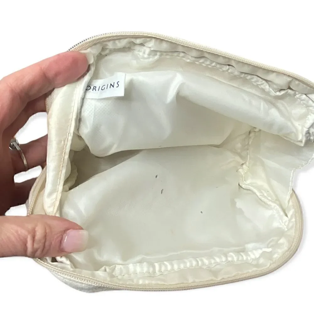 Origins cream canvas make up bag with zip closure small marks inside